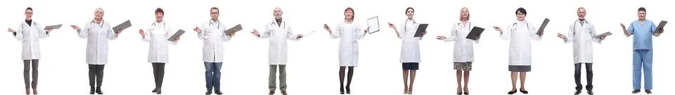 Full length group of doctors with notepad isolated Stock Photos