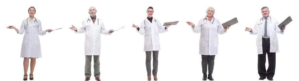 Full length group of doctors with notepad isolated Foto stock
