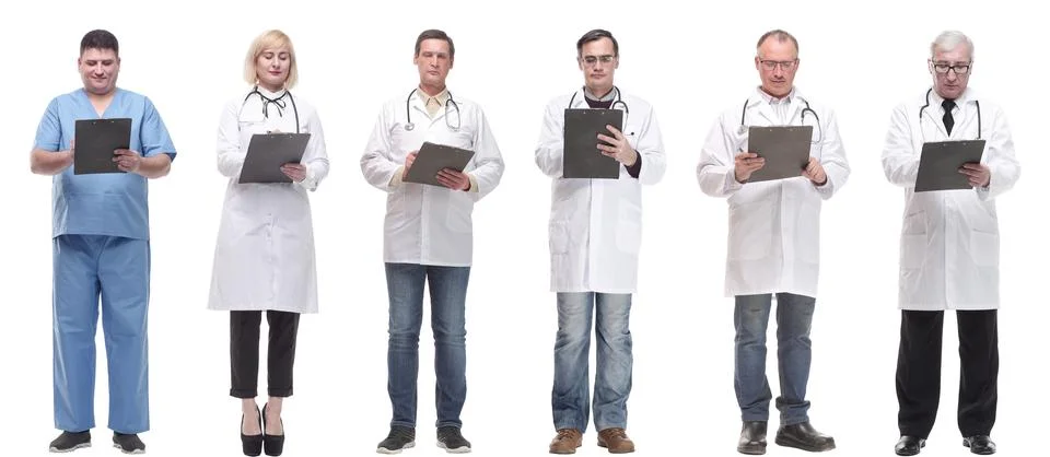 Full length group of doctors with notepad isolated Stock Photos