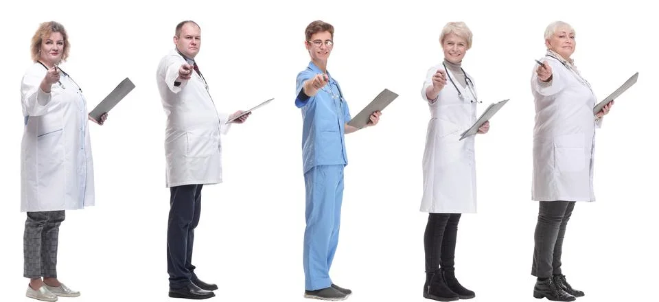 Full length group of doctors with notepad isolated Foto stock