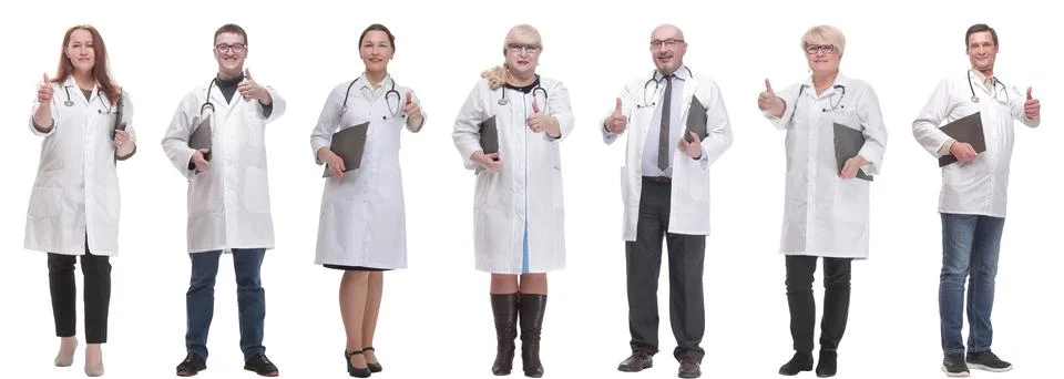 Full length group of doctors with notepad isolated Foto stock