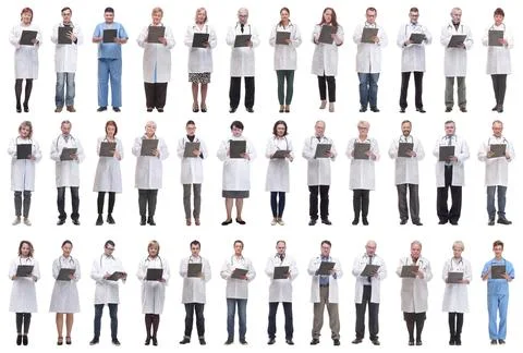 Full length group of doctors with notepad isolated Stock Photos