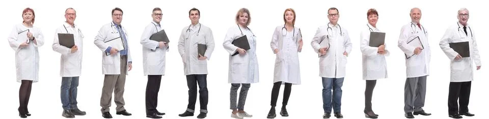 Full length group of doctors with notepad isolated 스톡 사진
