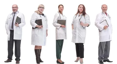 Full length group of doctors with notepad isolated Foto stock
