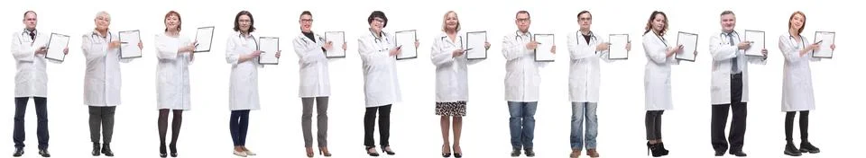 Full length group of doctors with notepad isolated Stock Photos