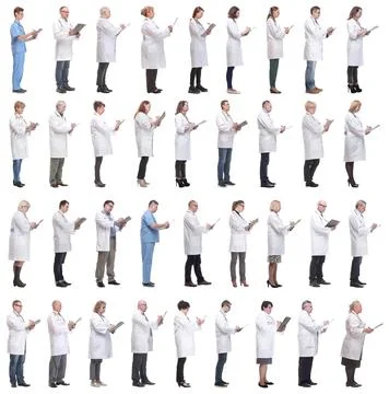 Full length group of doctors with notepad isolated Foto stock