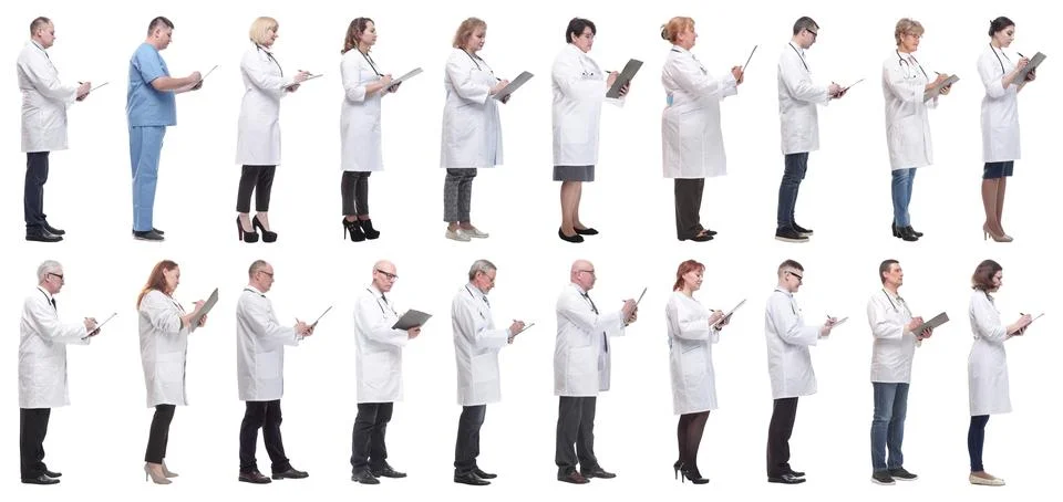 Full length group of doctors with notepad isolated 写真素材