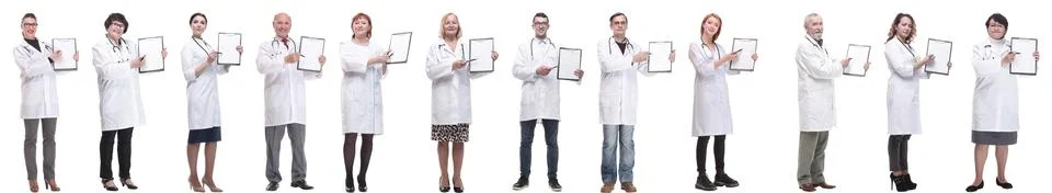Full length group of doctors with notepad isolated 스톡 사진