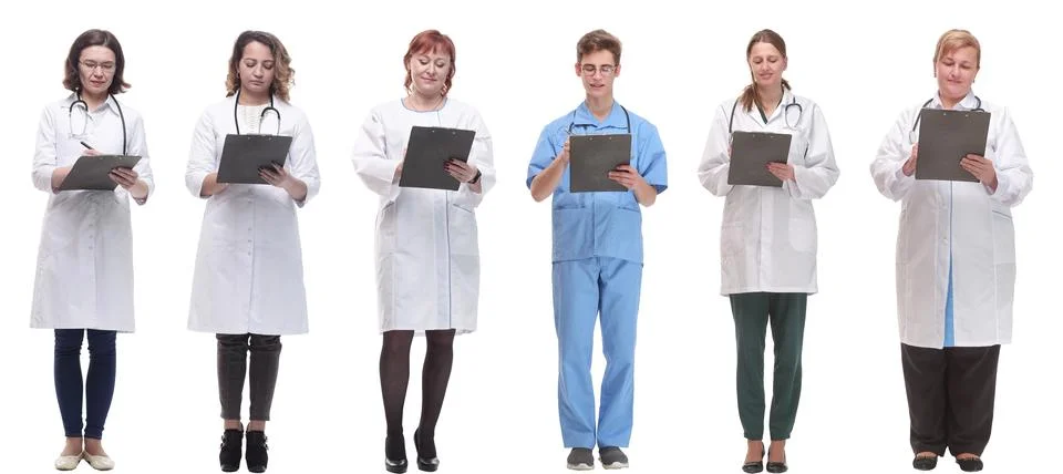 Full length group of doctors with notepad isolated 스톡 사진