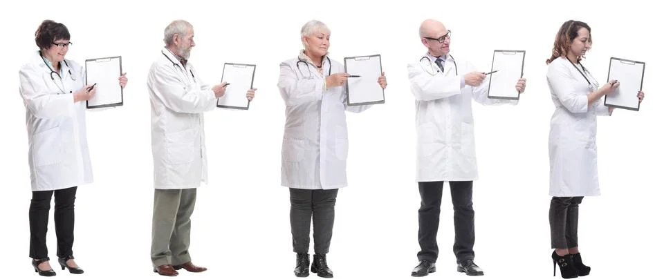Full length group of doctors with notepad isolated Foto stock