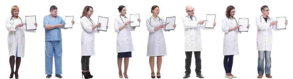 Full length group of doctors with notepad isolated Foto stock