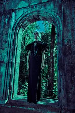 Full length portrait an aristocratic old widow woman in rich black dress stan Stock Photos