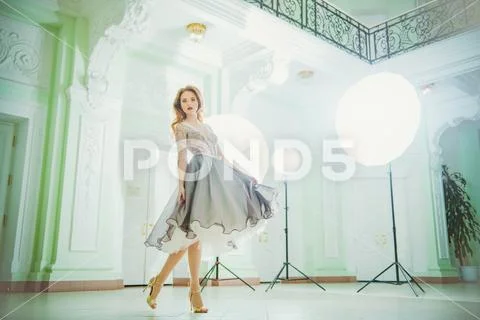A full length portrait of a beautiful elegant woman in the evening dress. Fas Stock Photos