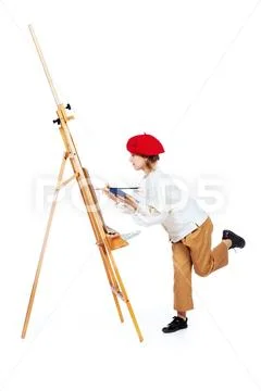 A full length portrait of a girl painting a picture. Creativity, artist. Stock Photos