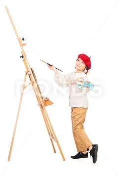 A full length portrait of a girl painting a picture. Creativity, artist. Stock Photos