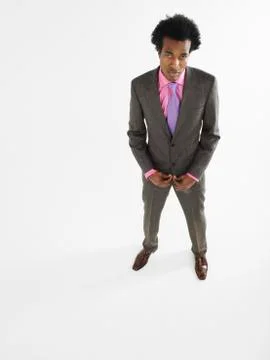 Full Length Portrait Of Man Standing In Suit Stock Photos
