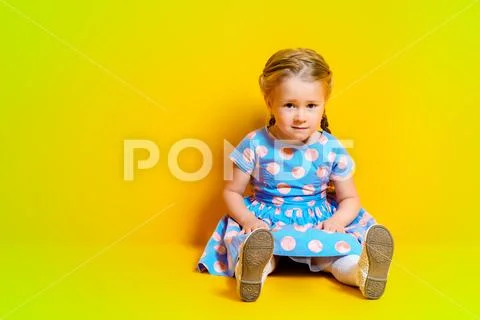 A full length portrait of a positive young pretty girl. Summer bright fashion Stock Photos