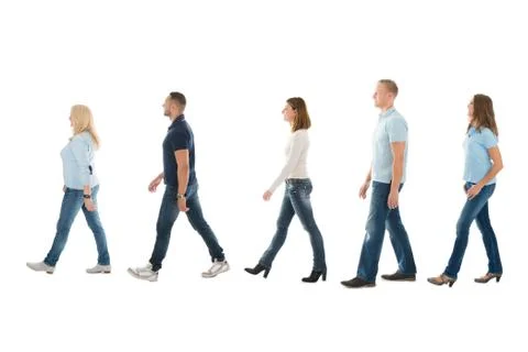 Full length side view of men and women walking in queue isolated on white bac Stock Photos