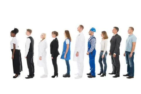 Full length side view of people with various occupations standing in queue ag Stock Photos