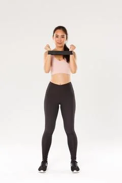 Full length of smiling and determined, slim brunette asian fitness girl 스톡 사진