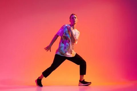 Full-length studio shot of young caucasian dancer training hip-hop isolated over Stock Photos