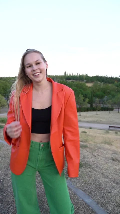 Full-length vertical video of a Russian woman with long hair posing Stock Footage 265003317
