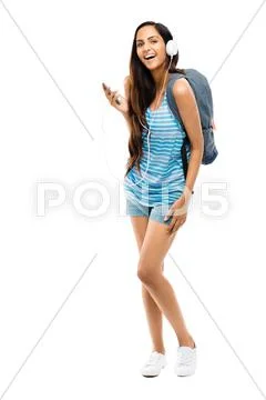 Full length young indian teenage schoolgirl white background Stock Photos