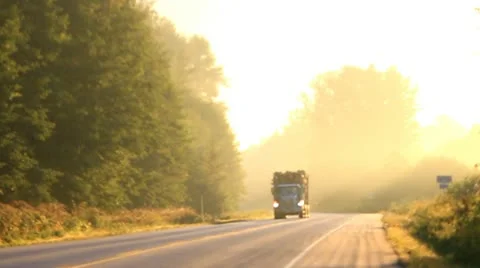 Full logging truck in sunlight Stock Footage 10747295