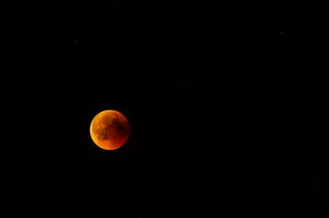 Full Lunar eclipse super moon red bloody, dark sky Fotos Stock