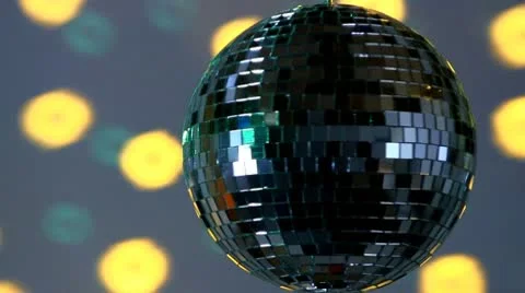 Full mirror ball; yellow and green light Stock Footage 10758403