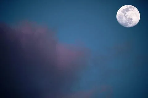Full Moon and Clouds in Blue Night Sky 写真素材