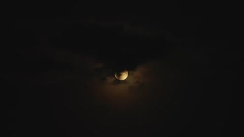 Full moon and clouds drifting across the sky - a magical moment at night.  Stock Footage 331839112