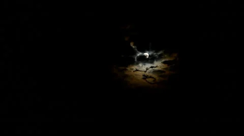 Full Moon and clouds over stormy night skyline Stock Footage 36817338