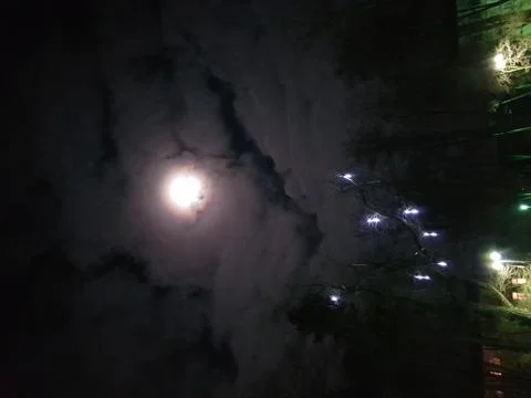 Full moon and clouds Stock Photos