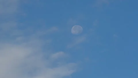 Full Moon and Cloudy Blue Sky Stock Footage 330360470