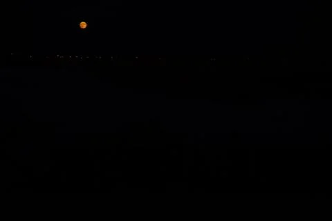 Full moon and light lanterns in black sky Photos