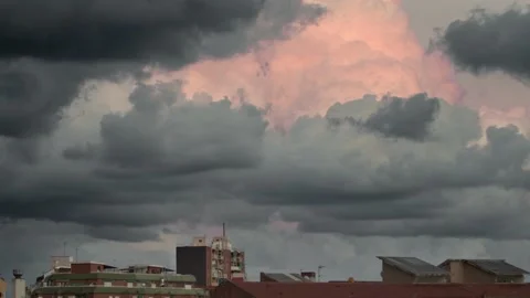 Full Moon appears after Storm Clouds, Timelapse from Rooftop Stock Footage 138457510