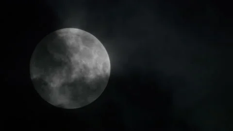 Full moon behind the clouds Stock Footage 168769341