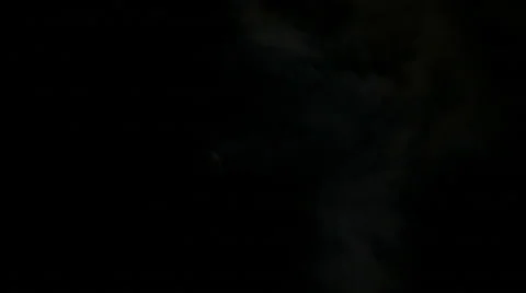 Full moon behind clouds at night Stock Footage 48840403