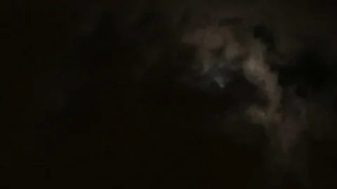 Full moon behind clouds at night. 4K UHD Stock Footage 70745706