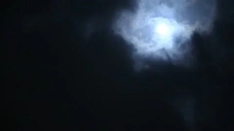 Full moon behind clouds at night Stock Footage 154818794