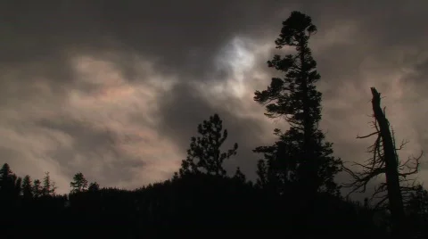 Full moon behind eerie clouds Stock Footage 533245