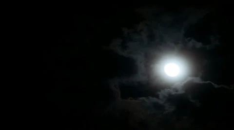 Full moon behind moving cloud at night. Stock Footage 36763209