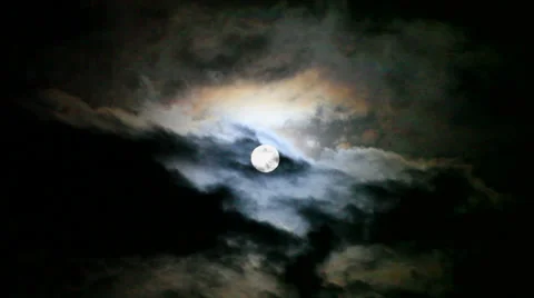 Full moon behind moving cloud at night Stock Footage 37129940