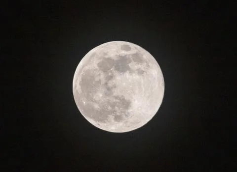 Full moon on black background almost duotone Foto stock