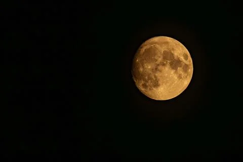 Full moon on a black background. Close-up of the moon Stock Photos