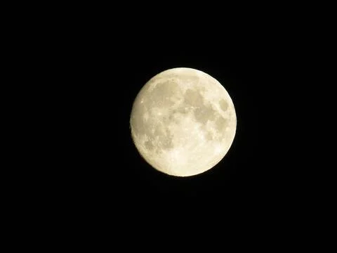 Full moon on black background Stock Photos