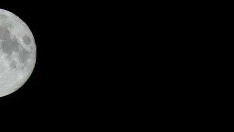 Full Moon Closeup optical zoom part 2 of 9 -passing by camera view left to right Stock Footage 112766114