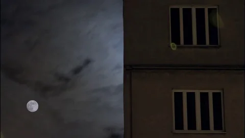 Full moon, clouds and windows Stock Footage 76100095