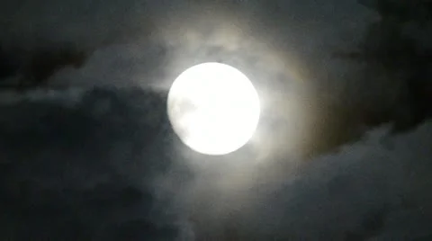 Full moon with clouds drifting past Stock Footage 10812501